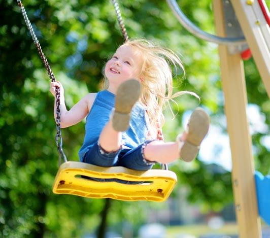 litle girl on swing / playground