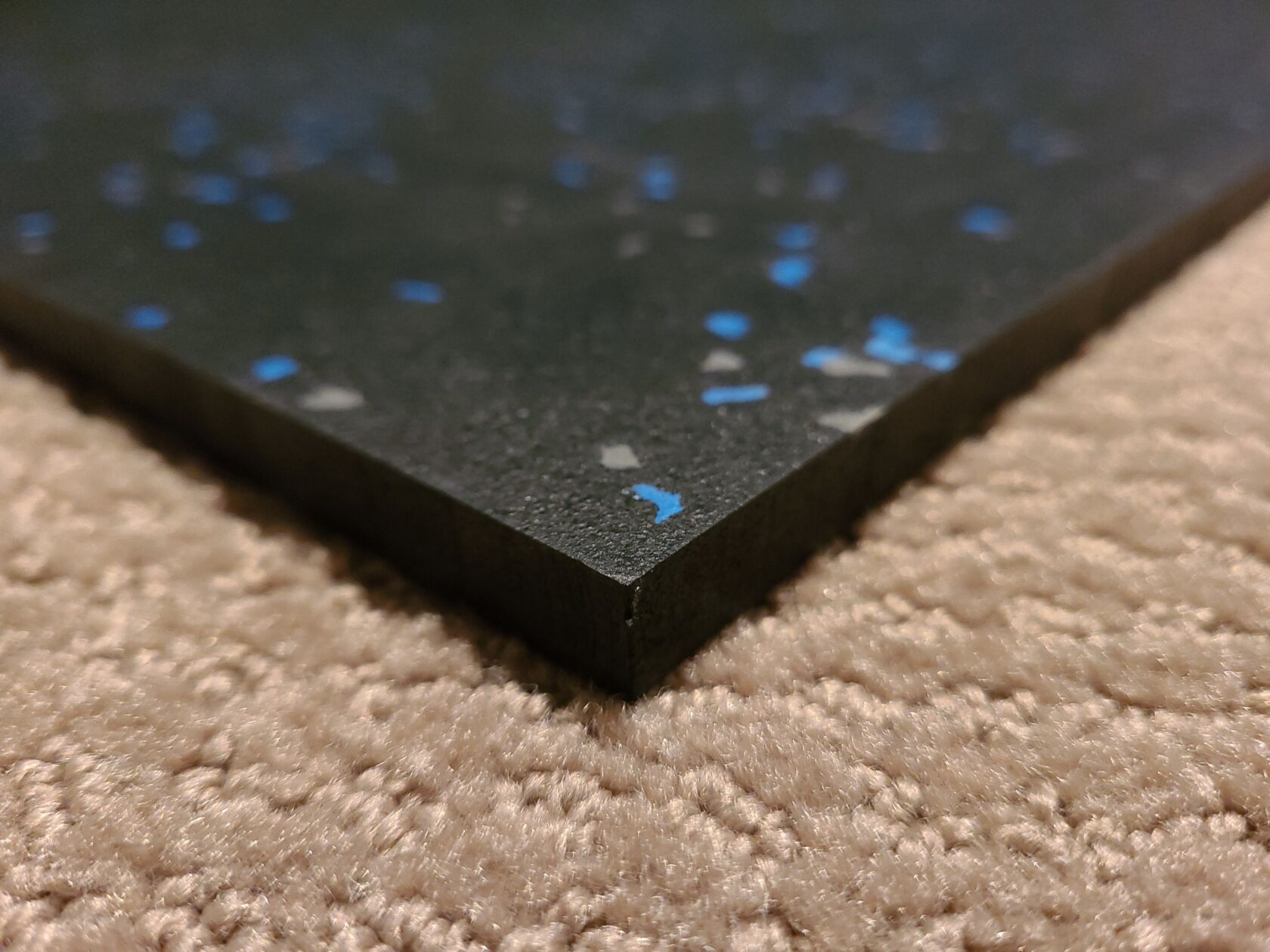 Rubber flooring on carpet